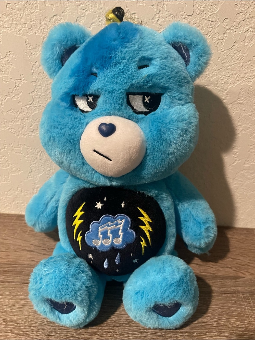 Care Bears Blue Storm Music Bear Plush with Black Belly Badge